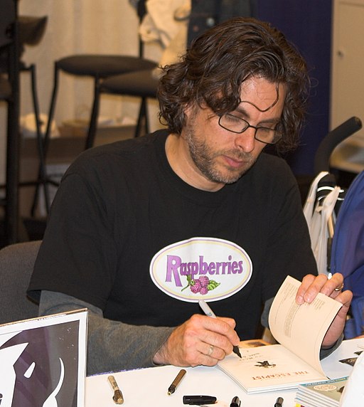 Michael Chabon signing his book at a book signing in 2006