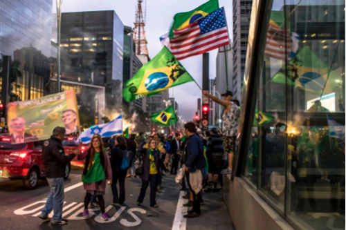 Brazilian Bolsonaro supporters celebrate with Brazilian, US, and Israeli flags