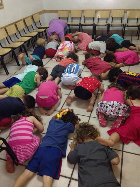 Children hunker down in Israeli kindergarten during Operation Protective Edge in Israel