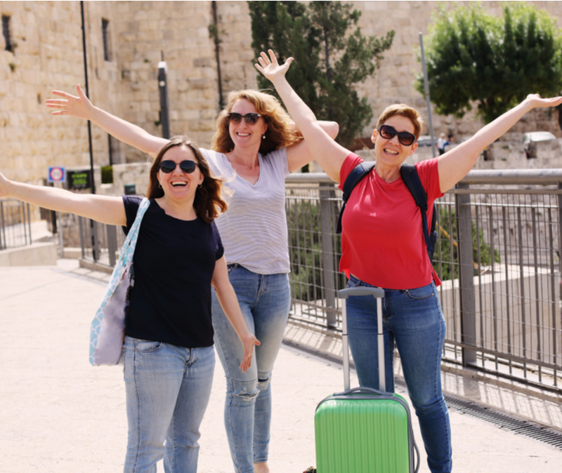 3 jubilant female tourists at Jaffa Gate Jerusalem