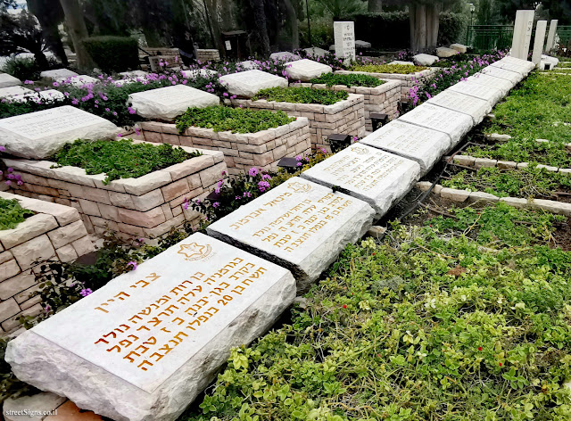 graves of 11 farmers massacred in 1948.